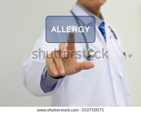 Doctor in white gown touching ALLERGY button on virtual screen