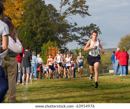 KNOXVILLE, TN - OCTOBER 28: The leader of the AAA boy\'s race at mile one of the TSSAA Region II Championship, on October 28, 2010 in Victor Ashe Park, Knoxville, Tennessee,