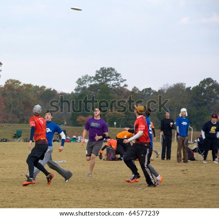 KNOXVILLE, TN - NOVEMBER 6: Ultimate Frisbee players get into position at the Dave Baldwin Memorial Tournament, November 6, 2010, Victor Ashe Park, Knoxville, Tennessee