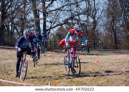 KNOXVILLE - JANUARY 22: Racers from various cycling teams compete during the annual Knoxiecross cyclocross series, January 22, 2011, Victor Ashe Park, Knoxville, Tennessee.