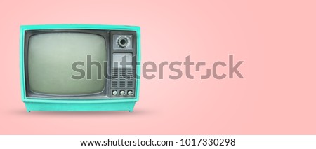 Retro television - old vintage tv on pastel color background. retro technology. flat lay, top view hero header. vintage color styles.