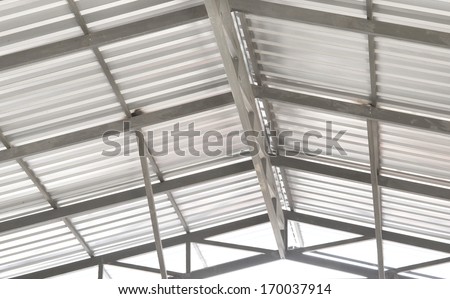 Architectural detail of metal roofing on commercial construction of modern building complex