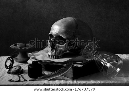 still life art photography on human skull  black and white version with film grain effect