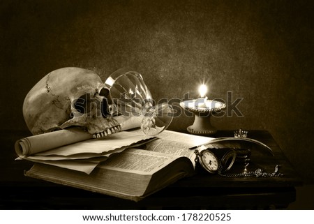 still life art photography on human skull  with open book