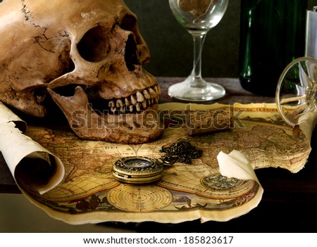 still life with skull  pirate , wine and map