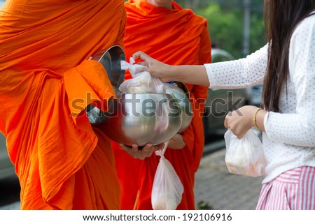 Buddhists have faith in Buddhism. giving alms to monks  receive alms