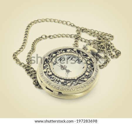 old antique pocket watch on white background