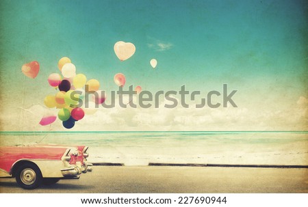 Vintage paper card car with heart balloon on beach blue sky concept of love in summer and wedding honeymoon