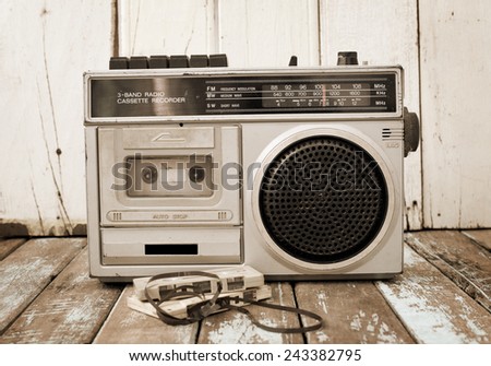 Vintage radio on wooden background