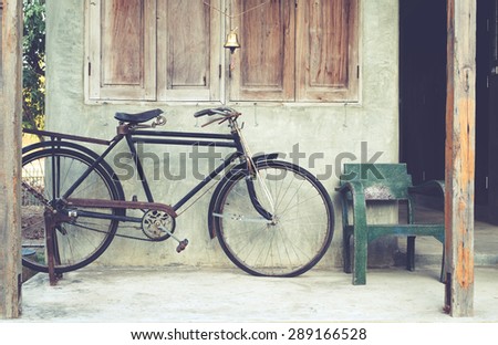 Vintage bicycle in coffee house, retro instagram effect
