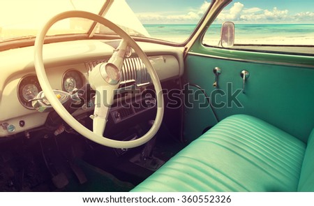 Interior of classic vintage car -parked seaside in summer