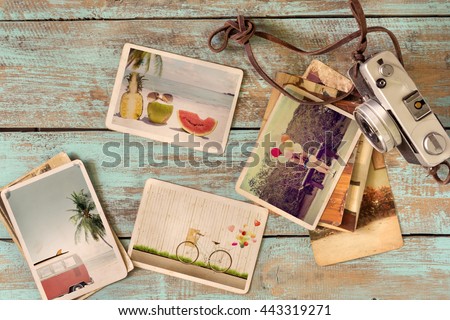 Photo album of journey honeymoon trip in summer on wood table. instant photo of retro camera - vintage and retro style