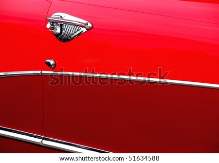 stock photo Classic candy apple red vintage car side