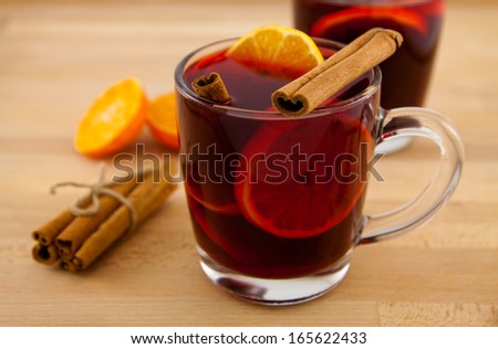 mug of mulled wine with cinnamon and orange
