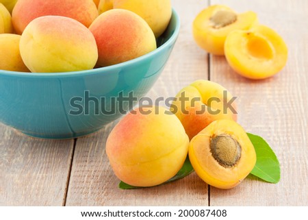 Juicy fresh peaches on wooden table