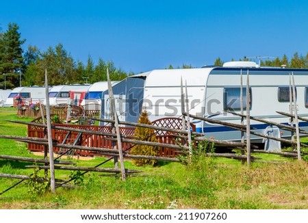 Modern luxury mobile homes in a caravan park.