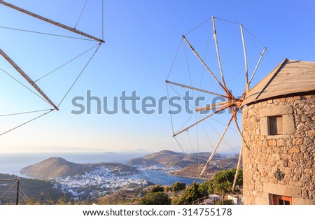 Windmills in the setting sun on the island of Patmos. Dodecanese archipelago in the Aegean See
