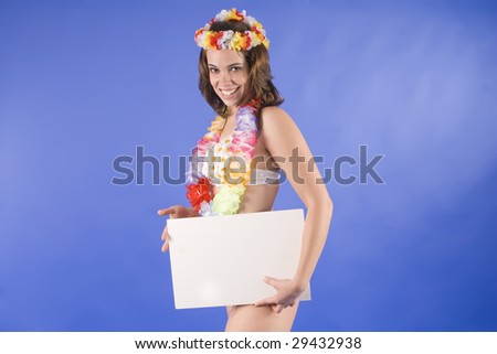 beautiful young hawaiian tropical woman isolated in blue