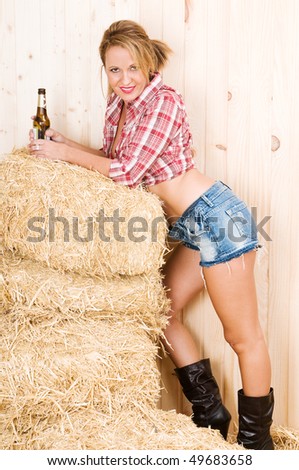 spice country woman in a barn