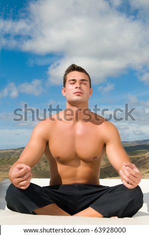 man under the sky relaxing doing meditation