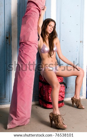 woman with bikini at a ship furniture room