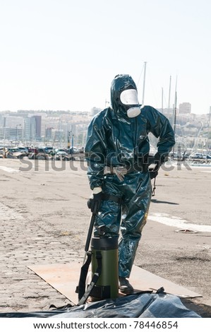 man with special ebola or virus dress or atomic contamination