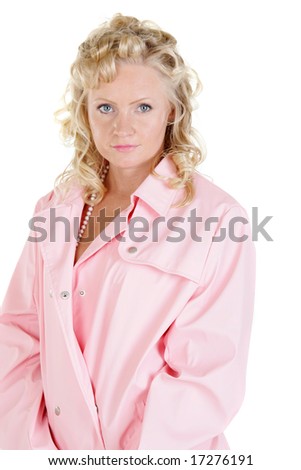 Sexy blonde woman wearing a pink raincoat and pearls