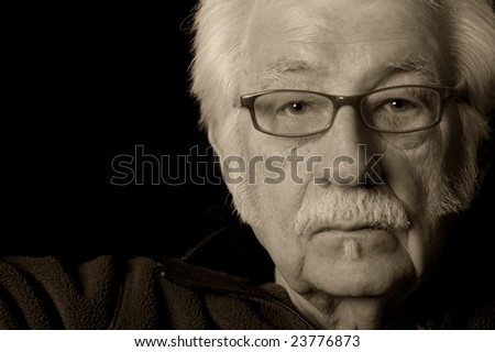 Artistic black and white portrait of an older man