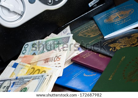 Passports and money - multi national ID, Seaman\'s Books, miscellaneous currency banknotes  - spy / agent concept / Intelligence Secret Service