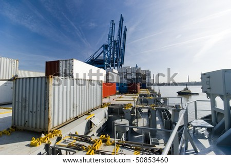 on-board container ship in port during cargo operation