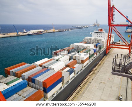 very large container-ship in the port during cargo operation