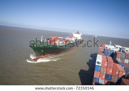 large container vessel ships at close encounter,  no logos in this picture