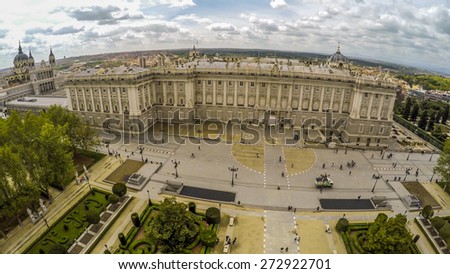 MADRID, SPAIN - APRIL 14,2015: Tourists near Royal palace. Royal palace in Madrid (Palacio Real de Madrid), differently East palace (Palacio de Oriente) - official residence of kings of Spain.