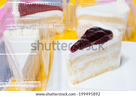 piece of blueberry cake in plastic box