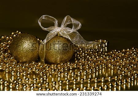 golden christmas ball and golden ribbon decoration