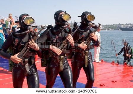 stock-photo-sevastopol-ukraine-july-russian-frogmen-participate-in-a-naval-show-on-russian-navy-24890701.jpg