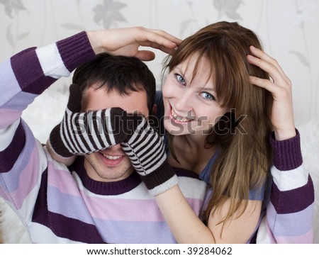 Attractive couple playing indoor