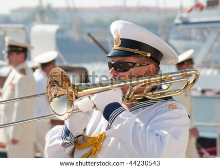 SEVASTOPOL, UKRAINE - JULY 29: Russian naval orchestra performs on naval review dedicated to Russian Navy Day on July 29, 2007 in Sevastopol, Ukraine.