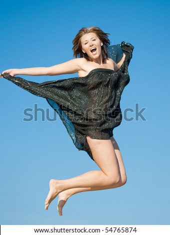 Barefoot girl in black skirt jumping and crying