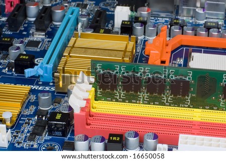Computer memory module in mainboard slot.