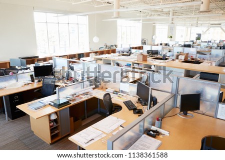 Partitioned computer workstations in an open plan office