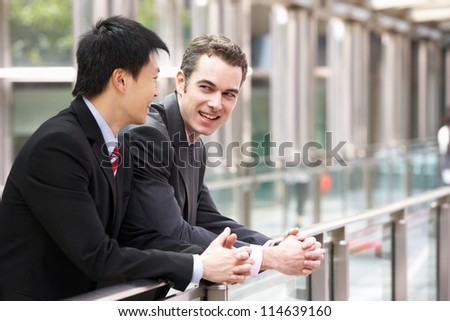 Two Businessmen Outside Modern Office