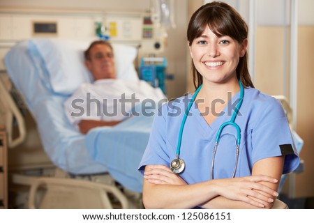 Portrait Of Nurse With Patient In Background Portrait Of Nurse With Patient In Background