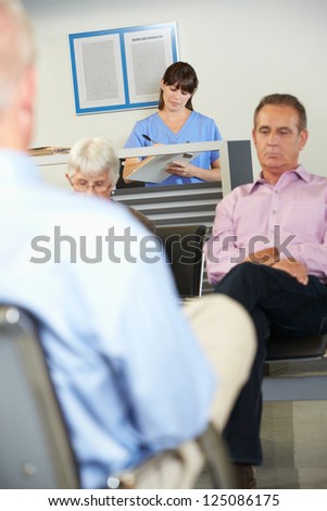 Patients In Doctor\'s Waiting Room