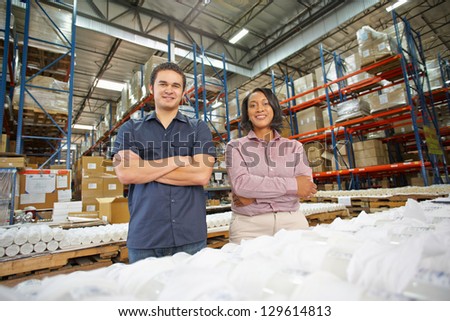 Portrait Of Factory Worker And Manager On Production Line
