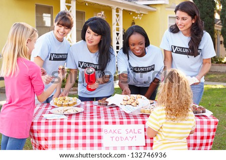 Women And Children Running Charity Bake Sale