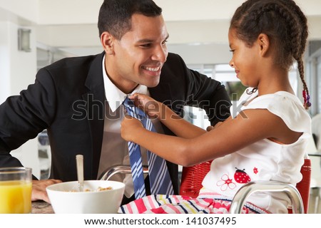 Daughter Straightens Father's Tie Before He Leaves For Work Daughter Straightens Father's Tie Before He Leaves For Work