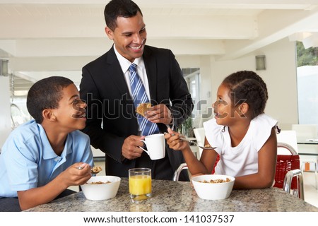 Father Having Breakfast With Children Before Work Father Having Breakfast With Children Before Work