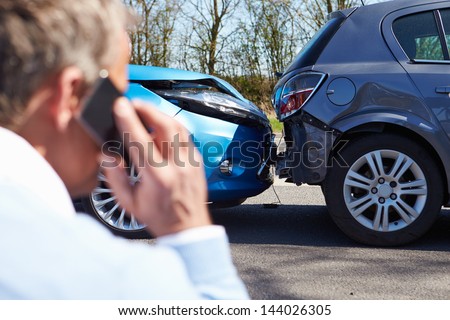 Driver Making Phone Call After Traffic Accident Driver Making Phone Call After Traffic Accident
