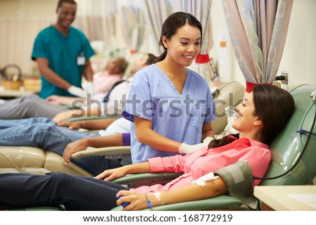 Blood Donors Making Donation In Hospital Blood Donors Making Donation In Hospital
